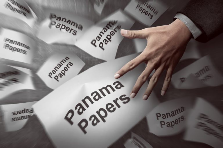 Image,Of,Man,Hand,Investigate,Panama,Papers,Scandal