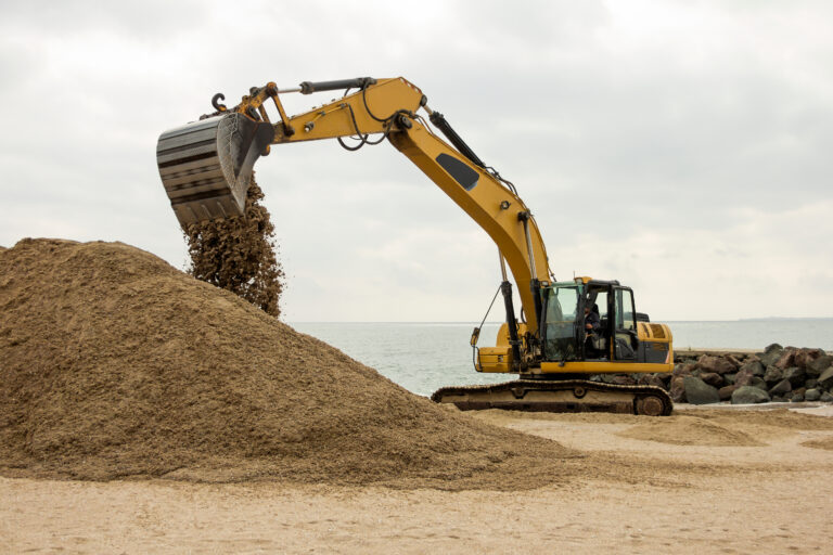 Excavator,Digs,Sand,On,The,Beach,Of,The,Bulgarian,Sea