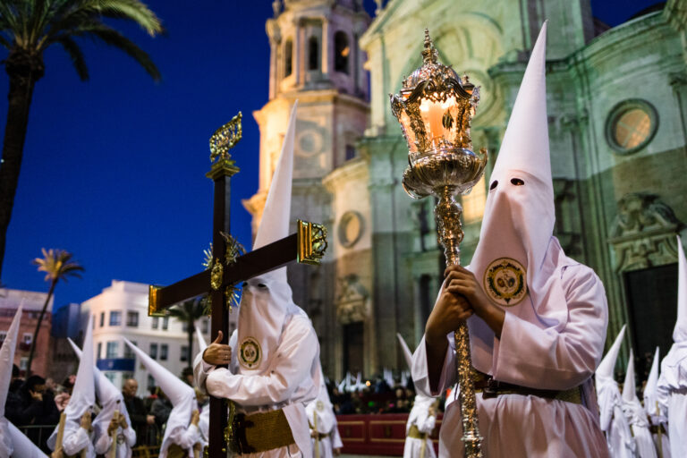 Men,In,White,Robes,With,Crucifix's,At,Semana,Santa,Festival