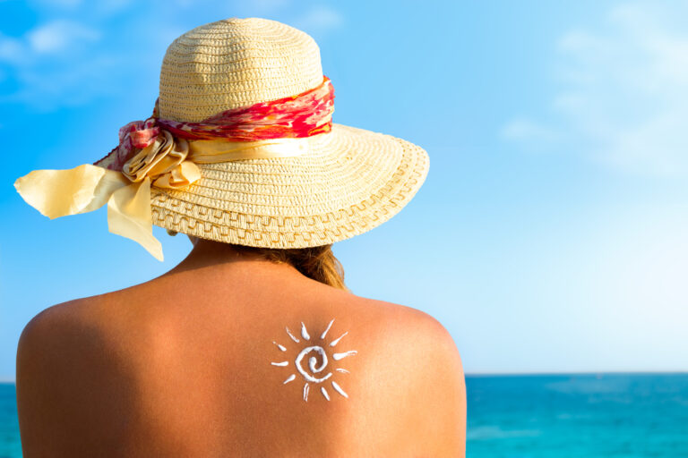 Suntan,Lotion,Woman,With,Sunscreen,Solar,Cream,Over,Ocean,Background
