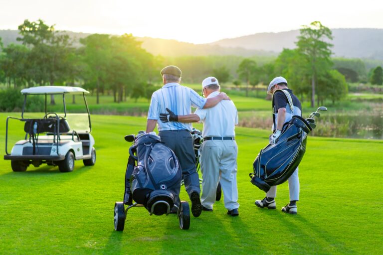 Group,Of,Asian,Businessman,And,Senior,Ceo,Holding,Golf,Bag