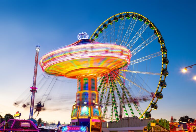 Funfair,Panorama,Wiht,Ferris,Wheel,And,Carousels,On,Big,German