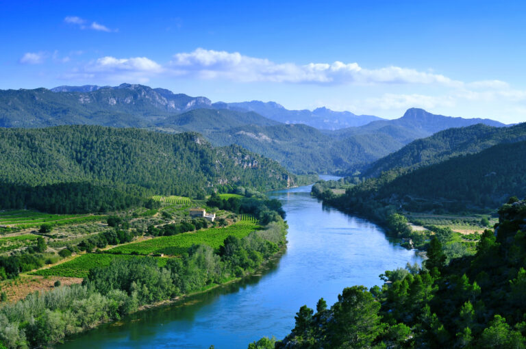 Ebro,River,Passing,Through,Miravet,,Spain,,With,The,Serra,De